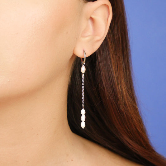 BEAMING - silver (single earring)